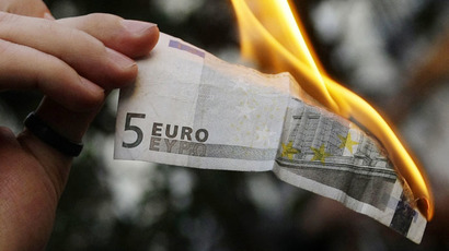 Euro spirals toward 1:1 parity with USD