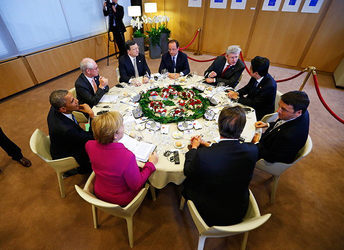 (L-R) U.S. President Barack Obama, European Council President Herman Van Rompuy, European Commission President Jose Manuel Barroso, France's President Francois Hollande, Canada's Prime Minister Stephen Harper, Japan's Prime Minister Shinzo Abe, Italy's Prime Minister Matteo Renzi, Britain's Prime Minister David Cameron and Germany's Chancellor Angela Merkel participate in a G7 leaders meeting at European Council headquarters in Brussels June 4, 2014 (Reuters / Yves Herman)