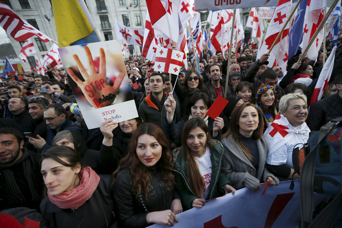 Opposition supporters attend a rally organised by the United National Movement, calling for the resignation of the government, in Tbilisi, March 21, 2015. (Reuters / David Mdzinarishvili)
