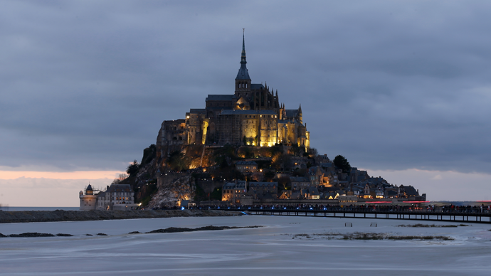 ‘Tide of century’: Thousands flock to ancient French abbey for rare supertide