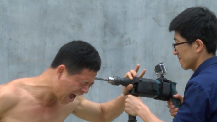 A man of steel & stone: Shaolin Kung-Fu master uses electric drill on his skull (GRAPHIC VIDEO)