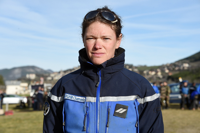 Alice Coldefy, a French gendarme from the PGHM (Gendarmerie High Mountain Rescue Squad), poses in Seyne-Les-Alpes near the crash site of the German Airbus A320 of the low-cost carrier Germanwings on April 3, 2015. (AFP Photo / Pascal Guyot)