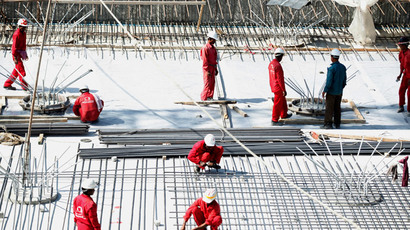 ‘Slave labor’: Migrants building Guggenheim, Louvre in UAE 'treated like battery hens'