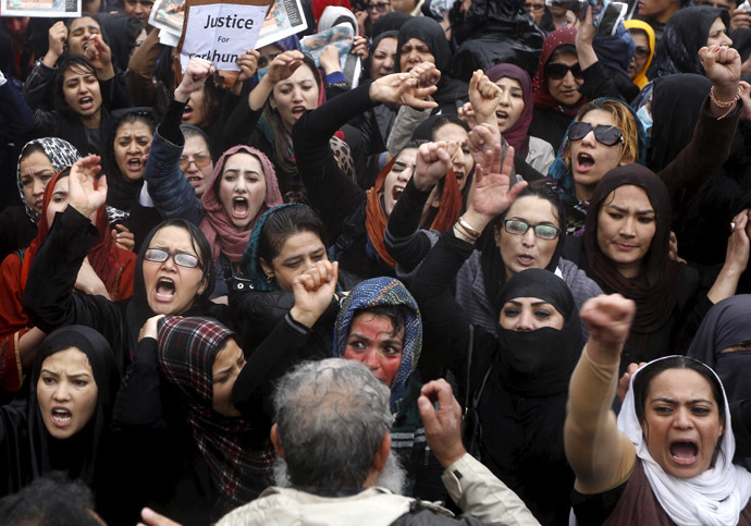 Members of civil society organizations chant slogans during a protest to condemn the killing of 27-year-old woman, Farkhunda, who was beaten with sticks and set on fire by a crowd of men in central Kabul in broad daylight on Thursday, in Kabul March 24, 2015. (Reuters/Omar Sobhani)