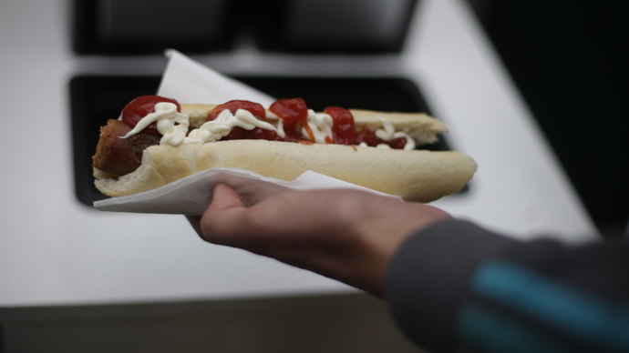 ​Forked over: Posh-boy Cameron mocked for eating a hot dog with cutlery