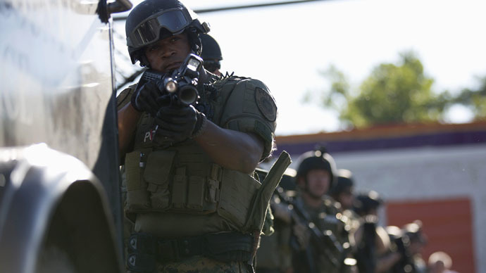 Standoffs in Ferguson, St. John, massive police presence