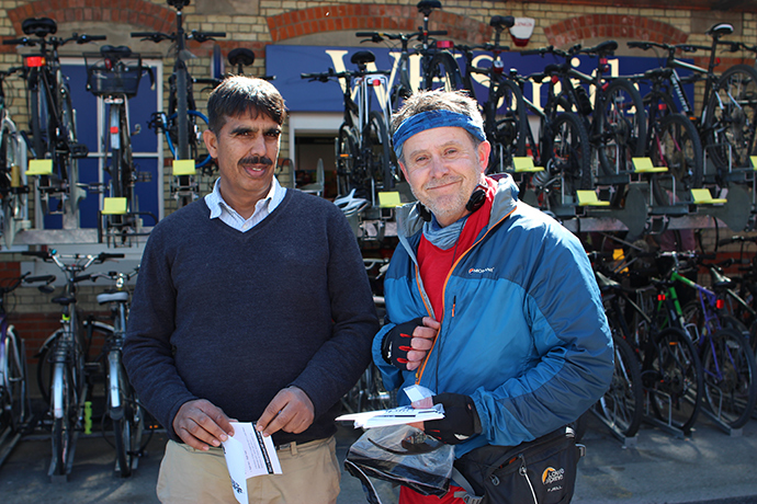 Taplin with local taxi driver, Mohammad Yasin. Photo by Tom Mellors