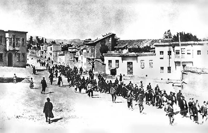 Armenians marched by Turkish soldiers, 1915.png More details Armenians are marched to a nearby prison in Mezireh by armed Turkish soldiers. Kharpert, Armenia, Ottoman Empire, April, 1915 (Image from Wikipedia)