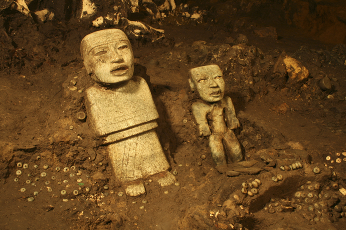 Stone figurines are seen in a tunnel that may lead to a royal tombs discovered at the ancient city of Teotihuacan (Reuters / INAH / Handout via Reuters)