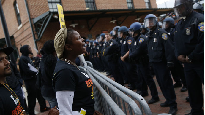 Unrest in Baltimore as thousands protest Freddie Gray’s death