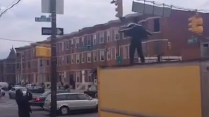 #FreddieGray supporter in Baltimore performs Michael Jackson hit to tell police 'Just Beat It'