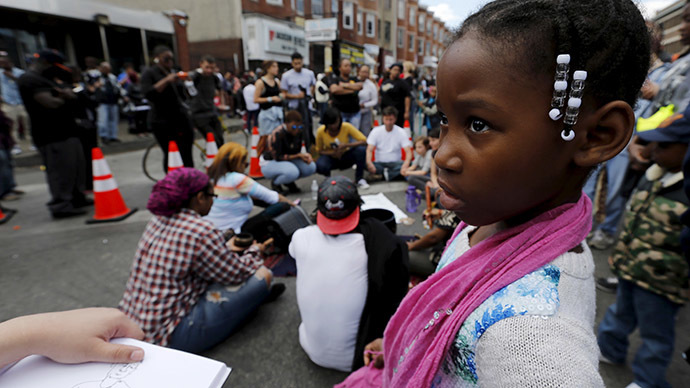 Peaceful protesters gather in Baltimore ahead of curfew