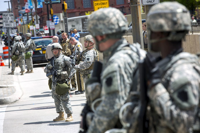 National Guard troops stand watch along E. Pratt St. in Baltimore, Maryland April 28, 2015. (Reuters/Eric Thayer)