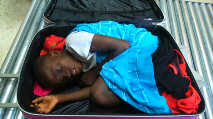 A picture provided by Spanish Guardia Civil on May 8, 2015 shows an 8-year-old sub-Saharan boy hidden in a suitcase. (AFP Photo)
