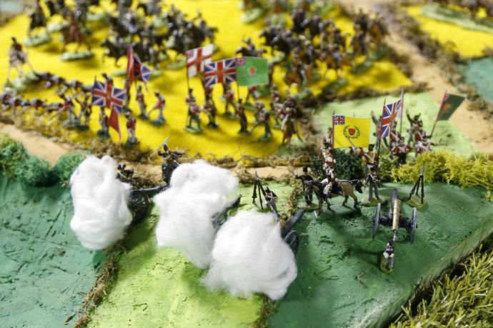 Miniature cannons on the British side of the Battle of Waterloo are seen firing, with cotton wool being used to depict smoke, on a 40-square-metre miniature model of the June 18, 1815 battlefield, in Diest, Belgium, in this picture taken on April 29, 2015. (Reuters/Francois Lenoir)