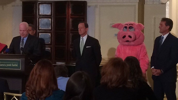 Here, piggie piggie: Pork-barrel spending is out, pig selfies are in for Sen. Jeff Flake