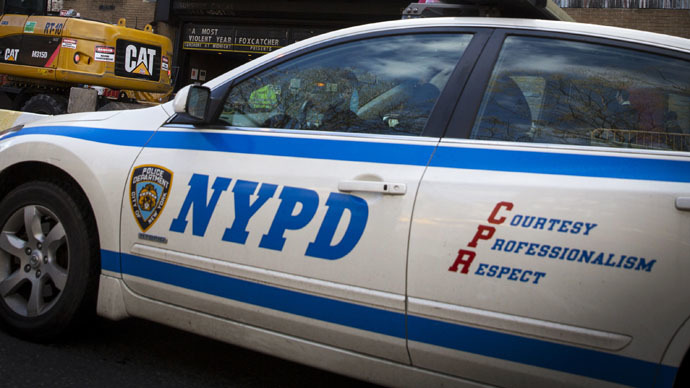 NYPD officers retreat as residents stop arrest of teenage girl (VIDEO)