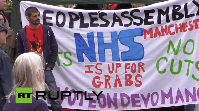 ​‘No more austerity’: Demonstrators gather in Manchester to protest cuts, Tory govt