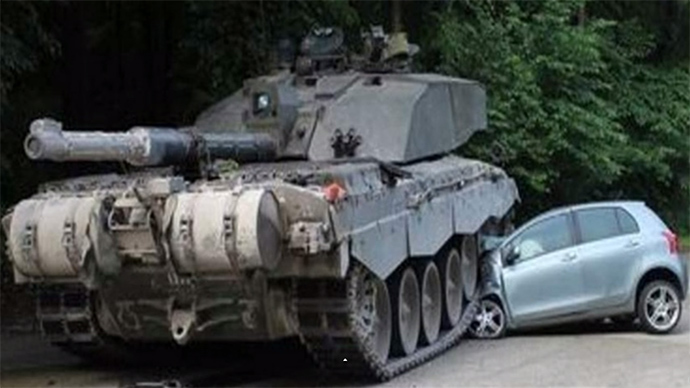 Teenage German girl narrowly cheats death as her car is crushed... by British tank (VIDEO)