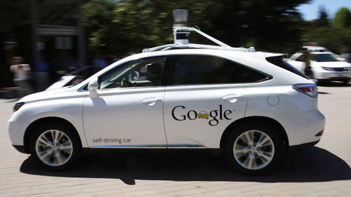 A Google self-driving vehicle drives around the parking lot at the Computer History Museum after a presentation in Mountain View, California May 13, 2014. (Reuters/Stephen Lam)