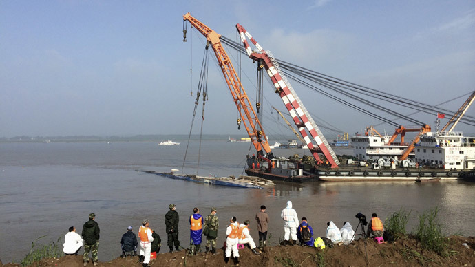 Chinese rescuers overturn capsized ship as disaster toll jumps above 100