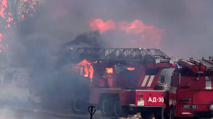 Fire engine, ambulance ablaze at Ukraine oil depot fire (VIDEO)