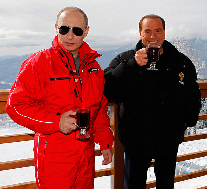 Russian President Vladimir Putin (L) and Former Italian Prime Minister Silvio Berlusconi (Reuters / Dmitry Astakhov)