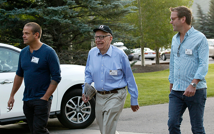 Rupert Murdoch, CEO of News Corp. and 21st Century Fox, arrives with sons Lachlan (L) and James (R) (Reuters / Rick Wilking)
