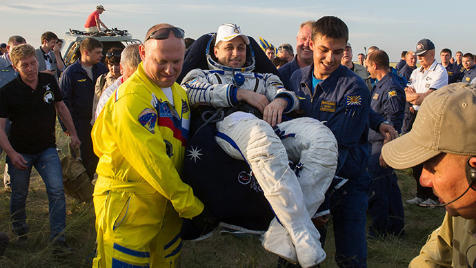 Delayed crew successfully, but belatedly returns to Earth from ISS (VIDEO)