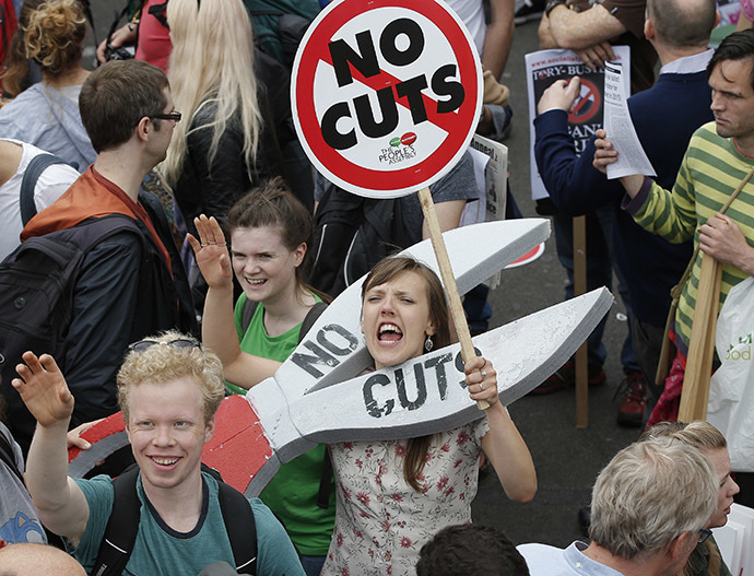 Demonstrators march during an anti-austerity protest in central London, Britain June 20, 2015. (Reuters/Peter Nicholls)