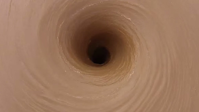 'May suck in a boat': Giant vortex in southern US lake wows onlookers (VIDEO)