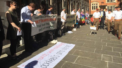 ​‘Stop profiting from war,’ Christian protesters tell Church of England