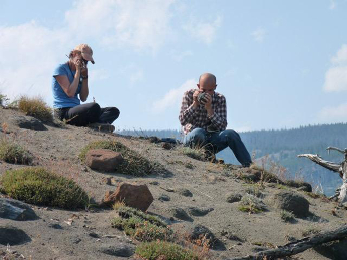 ASU professor Christy Till strives to better understand the potential for future eruptions at Yellowstone volcano by studying those in the recent past. She and paper co-author Jorge Vazquez examine Yellowstone lava in the field (Photo by Naomi Thompson)