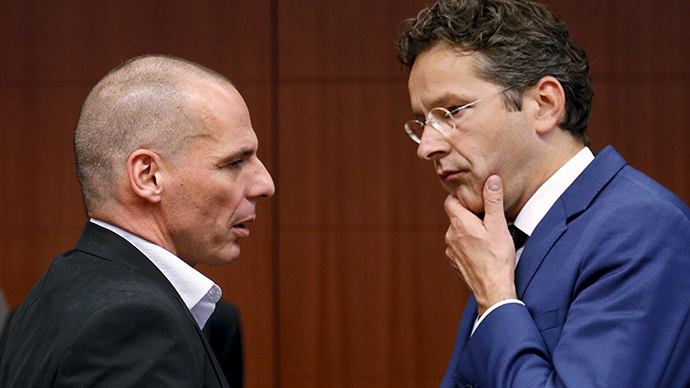 Former Greece's Finance Minister Yanis Varoufakis talks to Dutch Finance Minister and Eurogroup chairman Jeroen Dijsselbloem (R) (Reuters / Francois Lenoir)
