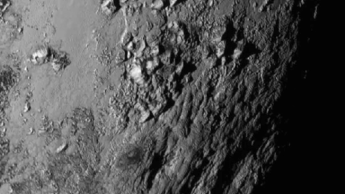 3,500m icy peaks of Pluto: NASA reveals striking images of dwarf planet (PHOTOS)