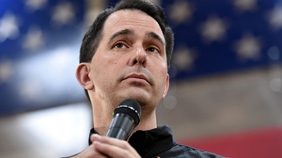 Wisconsin governor strips workers’ wage protections