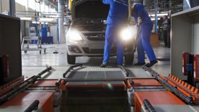 Peugeot blames crisis for 8,000 job cuts