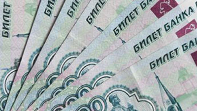 Rouble a spectator in currency drive to the bottom