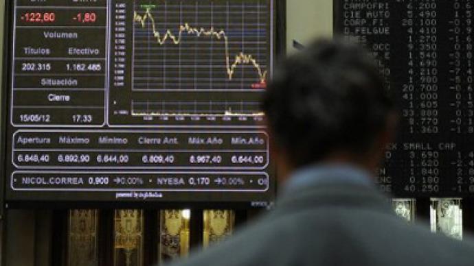Markets fall under Moody's attack on Spain