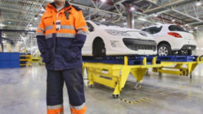 Peugeot blames crisis for 8,000 job cuts