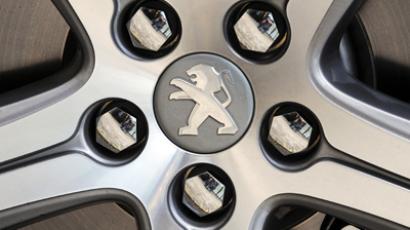 Peugeot unveils plan to save 1.5 billion euro
