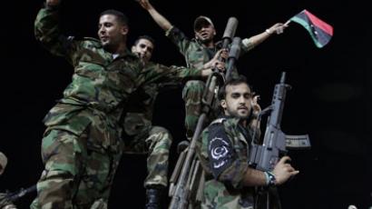 Eleven killed as Libyan militia shell Gaddafi stronghold