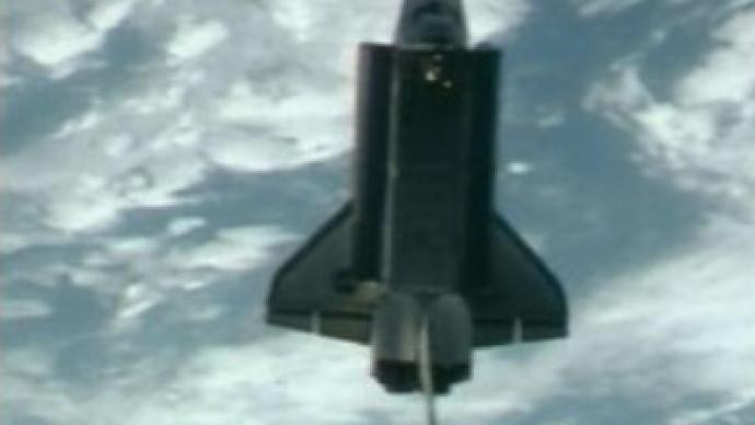 Bad weather keeping shuttle Atlantis in orbit