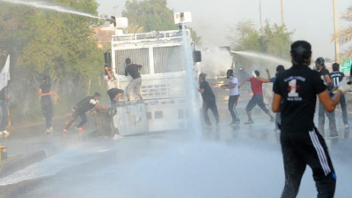 Bahraini police disperse protesters with tear gas, water cannon