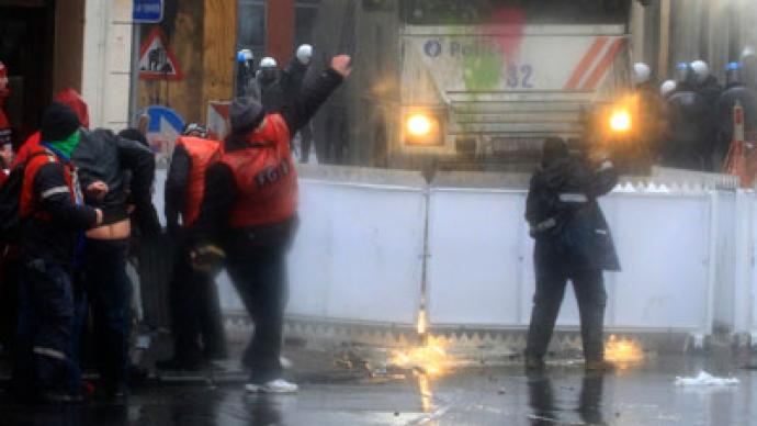 Belgian police fire water cannons to disperse striking ArcelorMittal workers