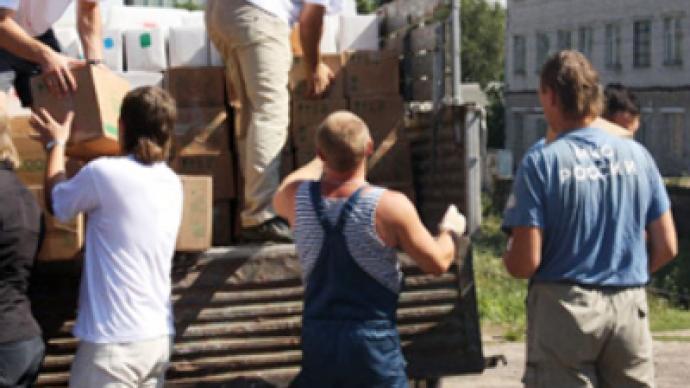 Russians gather aid for fire victims nationwide