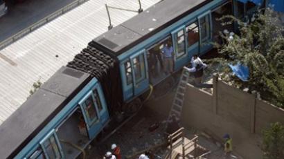 Train derails, catches fire near Cairo