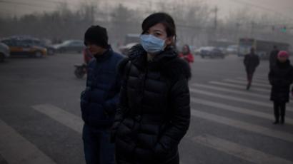 Schools close in fog as China eyes artificial rain to fight pollution