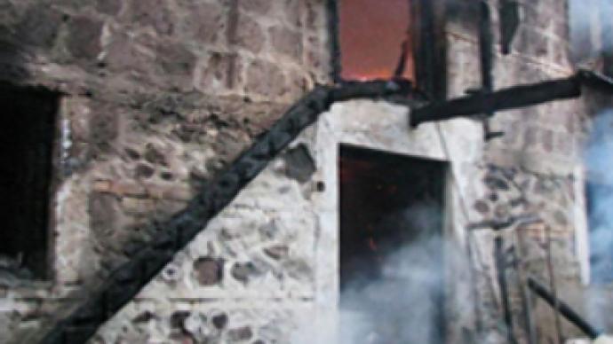 Civilians perish as Georgian troops torch church 