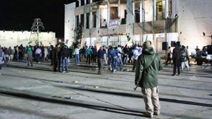 Coalition forces strike Gaddafi compound